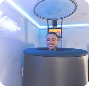 Cryo with woman smiling while she has a chilly experience 2