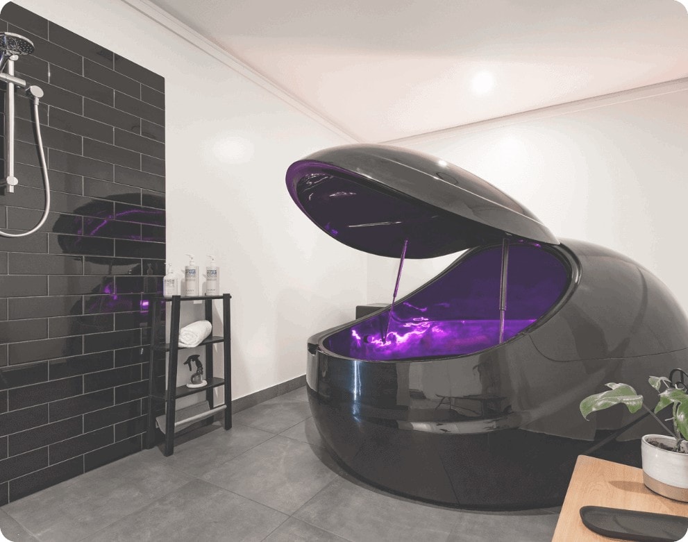 black float therapy pod with purple hue sydney