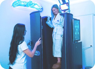 woman happy to be finished with her cryotherapy as she's leaving
